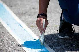 painting parking lot lines by hand