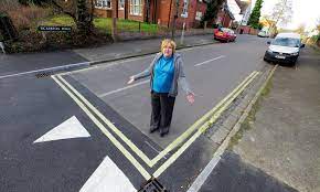 painting yellow lines on road