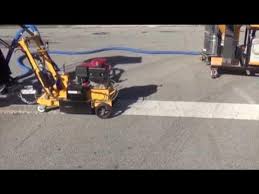 removing thermoplastic road markings