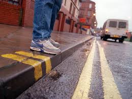 two yellow lines on pavement