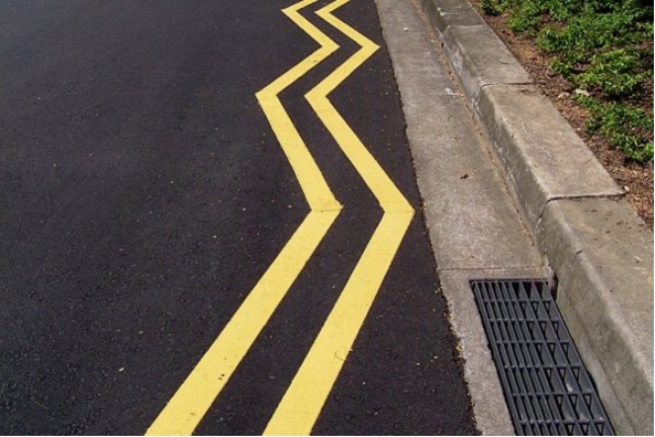 yellow zigzag lines on road